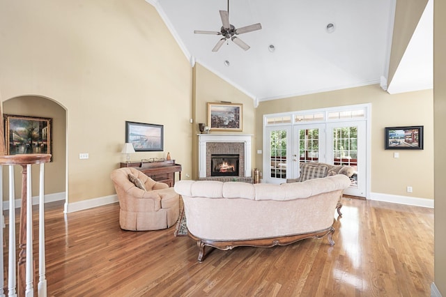 9732 Turnbridge Ct, Brentwood, TN 37027 - living area with ornamental molding, light wood-type flooring, a ceiling fan, a brick fireplace, and high vaulted ceiling