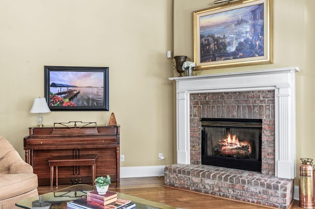 9732 Turnbridge Ct, Brentwood, TN 37027 - living area featuring a brick fireplace and wood finished floors
