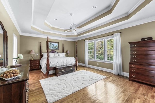 9732 Turnbridge Ct, Brentwood, TN 37027 - bedroom with a tray ceiling, crown molding, wood finished floors, and a ceiling fan