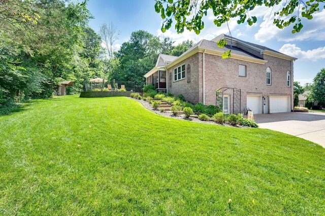 9732 Turnbridge Ct, Brentwood, TN 37027 - view of grassy yard featuring an attached garage and driveway