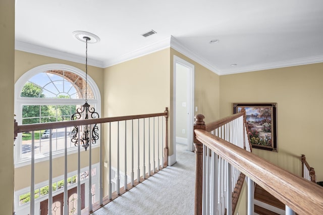 9732 Turnbridge Ct, Brentwood, TN 37027 - hall featuring a chandelier, carpet floors, an upstairs landing, and ornamental molding