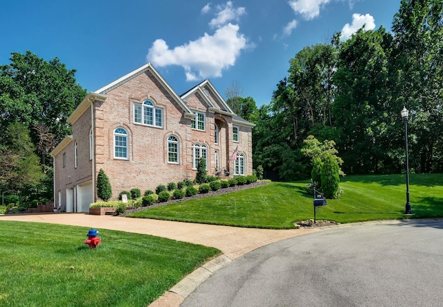 9732 Turnbridge Ct, Brentwood, TN 37027 - colonial house with an attached garage, brick siding, a front lawn, and driveway
