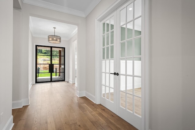 7428 Leelee Dr, Franklin, TN 37064 - entryway with ornamental molding, hardwood / wood-style floors, and a chandelier