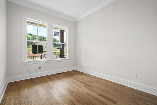 7428 Leelee Dr, Franklin, TN 37064 - unfurnished room featuring wood finished floors and ornamental molding