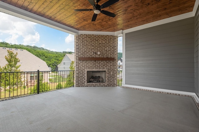 7428 Leelee Dr, Franklin, TN 37064 - view of patio / terrace featuring an outdoor brick fireplace and ceiling fan