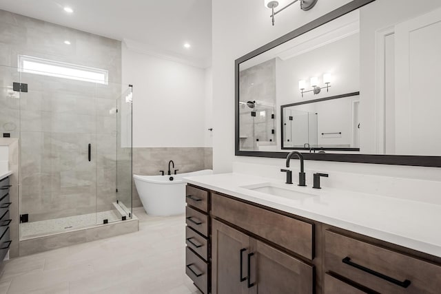7428 Leelee Dr, Franklin, TN 37064 - bathroom featuring vanity, a shower stall, a soaking tub, tile patterned floors, and recessed lighting