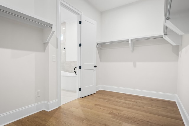 7428 Leelee Dr, Franklin, TN 37064 - spacious closet featuring wood finished floors