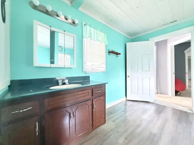 2844 Jarman Hollow Rd, Palmyra, TN 37142 - bathroom featuring wood finished floors, vanity, wood ceiling, and ornamental molding