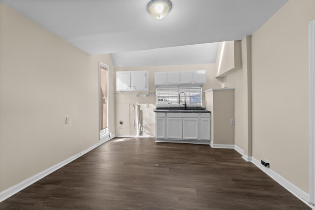 420 E State St E, Murfreesboro, TN 37130 - unfurnished living room featuring dark wood-style floors and a sink