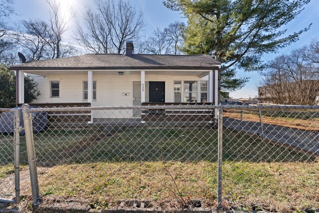 420 E State St E, Murfreesboro, TN 37130 - bungalow-style house featuring a chimney, covered porch, and roof with shingles
