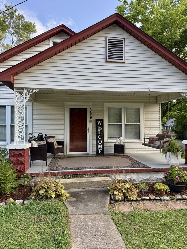 909 W 1st St, Dickson, TN 37055 - view of front of house with a porch