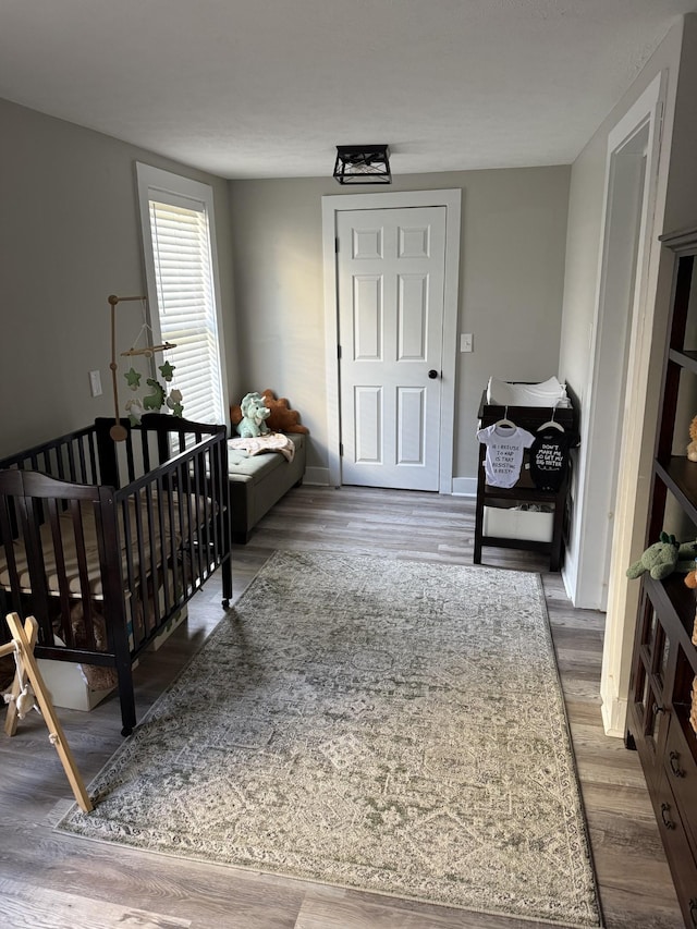 909 W 1st St, Dickson, TN 37055 - bedroom featuring wood finished floors