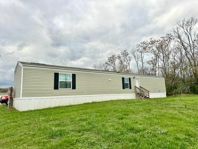 0 Loyalty Ln, Sparta, TN 38583 - back of house with entry steps and a yard