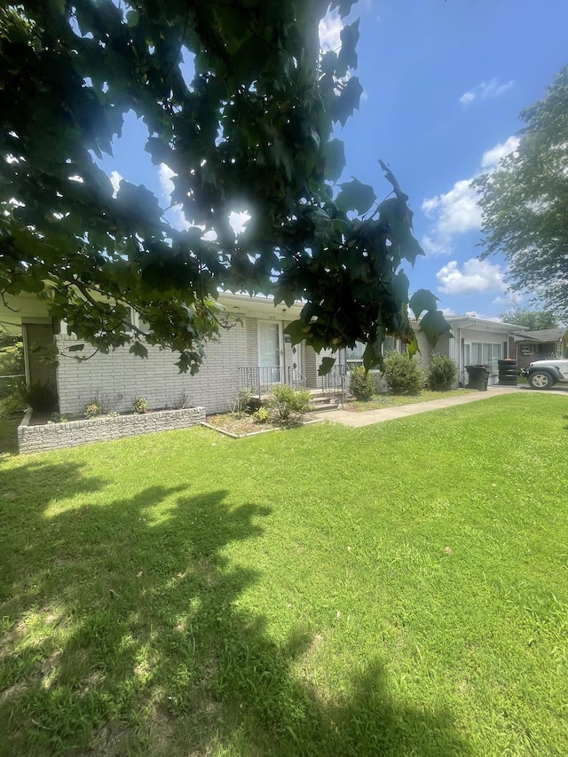 1212 Poplar Dr, Lawrenceburg, TN 38464 - view of green lawn