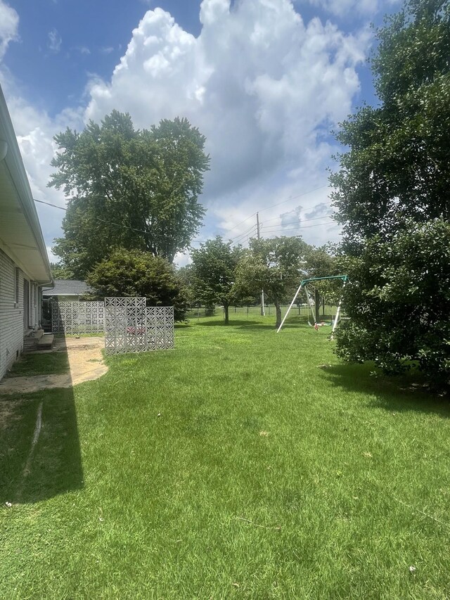 1212 Poplar Dr, Lawrenceburg, TN 38464 - view of yard with a playground
