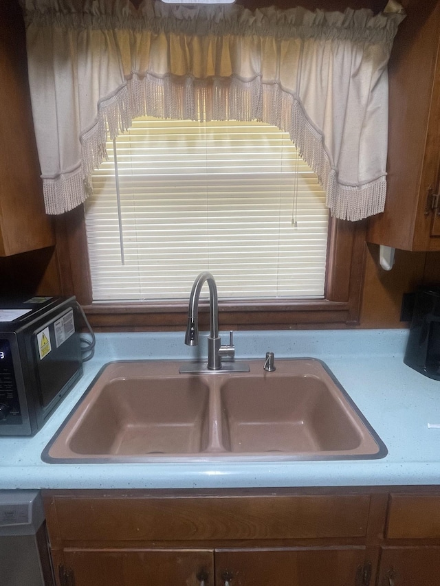 1212 Poplar Dr, Lawrenceburg, TN 38464 - kitchen view of light countertops and dishwashing machine