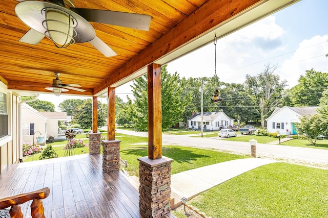 305 Bryant St, Watertown, TN 37184 - porch featuring ceiling fan, a yard, and a residential view