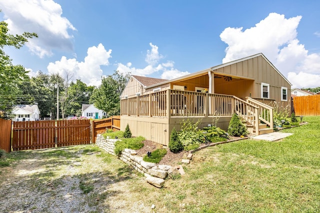 305 Bryant St, Watertown, TN 37184 - view of side of home featuring board and batten siding and a wooden deck