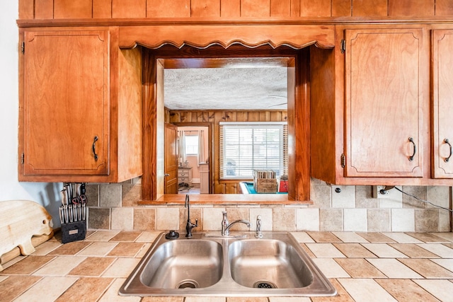 305 Bryant St, Watertown, TN 37184 - kitchen featuring tile counters and brown cabinets