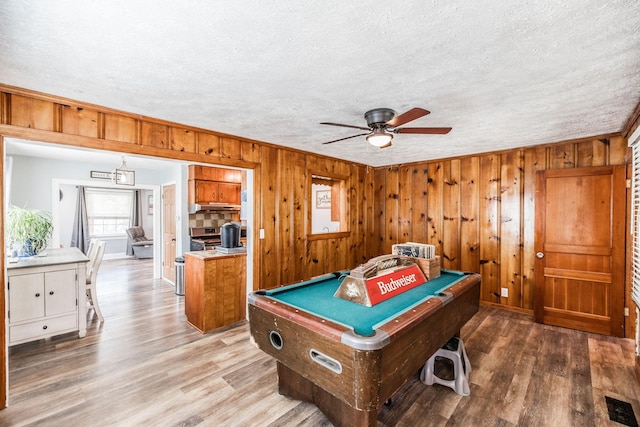305 Bryant St, Watertown, TN 37184 - game room featuring billiards table, a ceiling fan, light wood finished floors, wood walls, and a textured ceiling