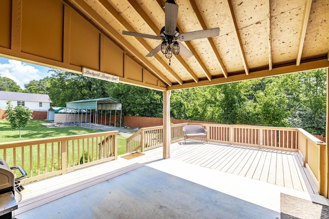 305 Bryant St, Watertown, TN 37184 - deck featuring a ceiling fan, a fenced backyard, a storage unit, and view of wooded area