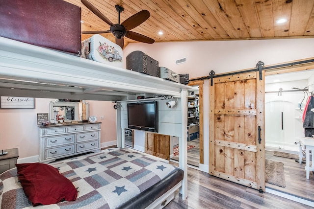305 Bryant St, Watertown, TN 37184 - bedroom with wooden ceiling, a barn door, vaulted ceiling, wood finished floors, and recessed lighting