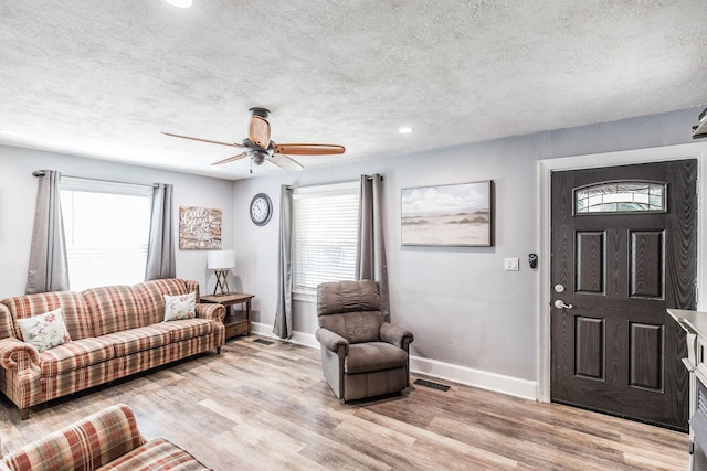 305 Bryant St, Watertown, TN 37184 - living area with light wood-type flooring, a textured ceiling, ceiling fan, and recessed lighting