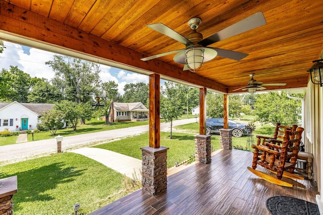 305 Bryant St, Watertown, TN 37184 - wooden porch with a lawn and a ceiling fan