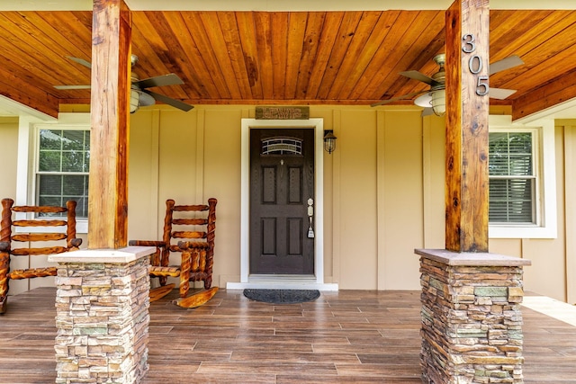 305 Bryant St, Watertown, TN 37184 - doorway to property with board and batten siding and covered porch