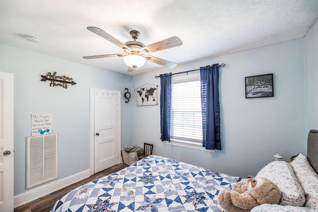 305 Bryant St, Watertown, TN 37184 - bedroom featuring wood finished floors, a ceiling fan, and a textured ceiling