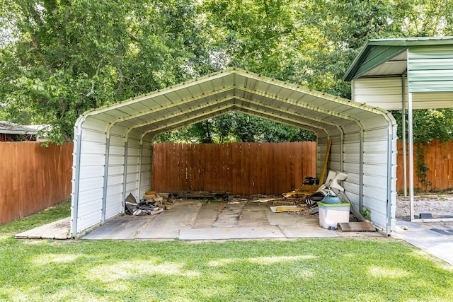 305 Bryant St, Watertown, TN 37184 - view of vehicle parking featuring a carport and a fenced backyard