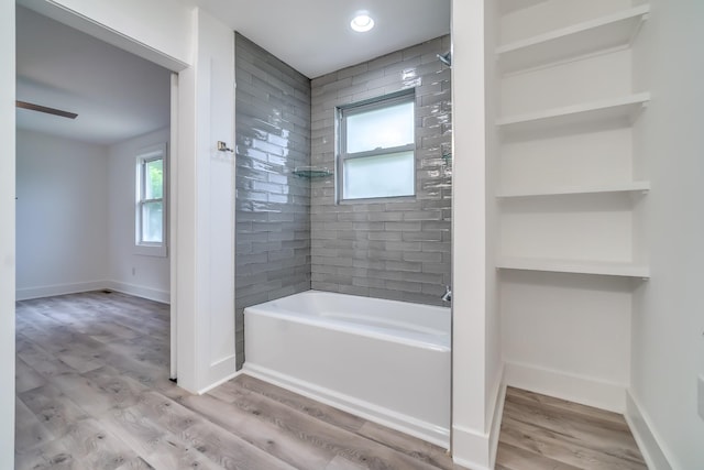 4819 Whites Creek Pike, Whites Creek, TN 37189 - bathroom with washtub / shower combination and wood finished floors