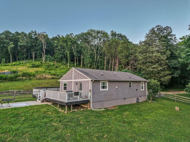 4819 Whites Creek Pike, Whites Creek, TN 37189 - rear view of house with a deck, board and batten siding, and a forest view