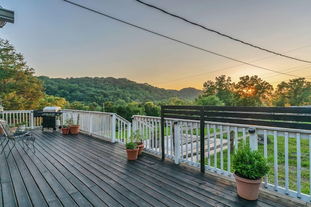 4819 Whites Creek Pike, Whites Creek, TN 37189 - deck at dusk with area for grilling and a view of trees