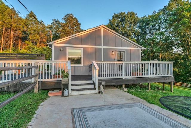 4819 Whites Creek Pike, Whites Creek, TN 37189 - back of property featuring board and batten siding, a deck, and a patio