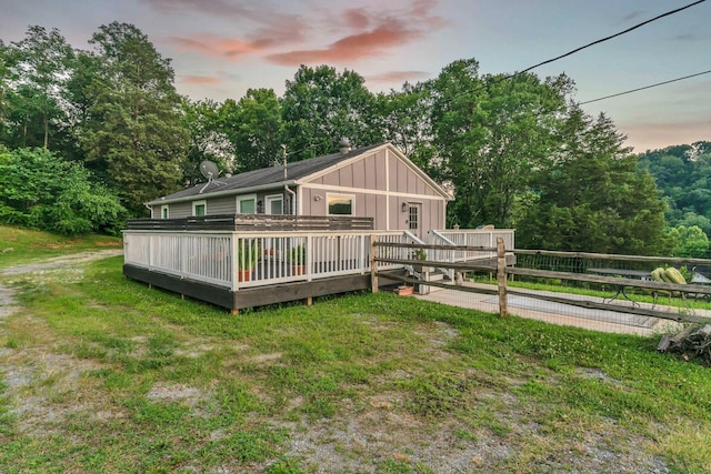 4819 Whites Creek Pike, Whites Creek, TN 37189 - back of house with a wooden deck, board and batten siding, and a lawn