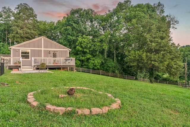 4819 Whites Creek Pike, Whites Creek, TN 37189 - yard at dusk featuring a wooden deck and a fenced backyard
