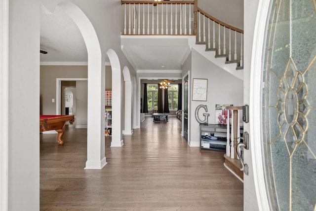 3723 Reed Rd, Indian Mound, TN 37079 - entryway with wood finished floors, arched walkways, crown molding, and pool table
