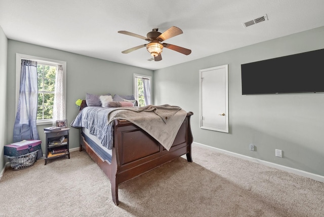3723 Reed Rd, Indian Mound, TN 37079 - bedroom with multiple windows, light colored carpet, and ceiling fan