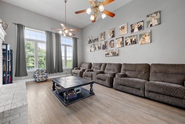3723 Reed Rd, Indian Mound, TN 37079 - living room with a ceiling fan, wood finished floors, and a fireplace