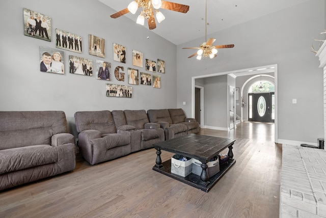 3723 Reed Rd, Indian Mound, TN 37079 - living room featuring a ceiling fan, a high ceiling, and wood finished floors