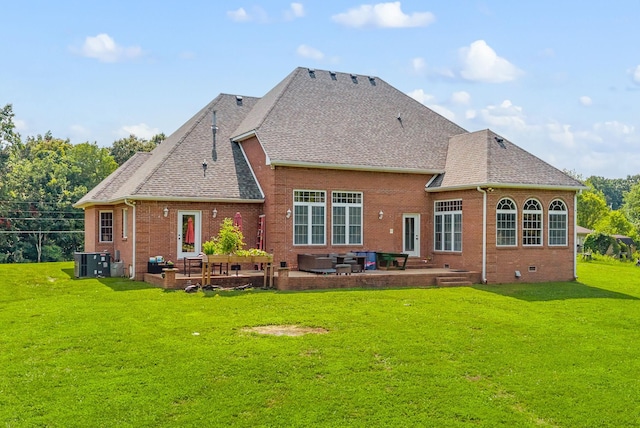 3723 Reed Rd, Indian Mound, TN 37079 - back of property featuring a patio area, brick siding, roof with shingles, and a yard