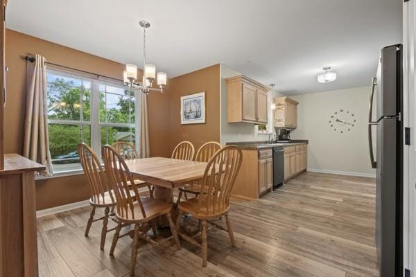 414 Grace St, Springfield, TN 37172 - dining space with light wood-style floors and a chandelier