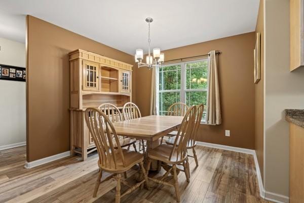 414 Grace St, Springfield, TN 37172 - dining room featuring a chandelier and wood finished floors