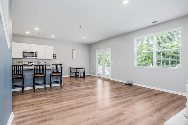 124 Nunally Dr, Baxter, TN 38544 - living room with recessed lighting and light wood-style flooring