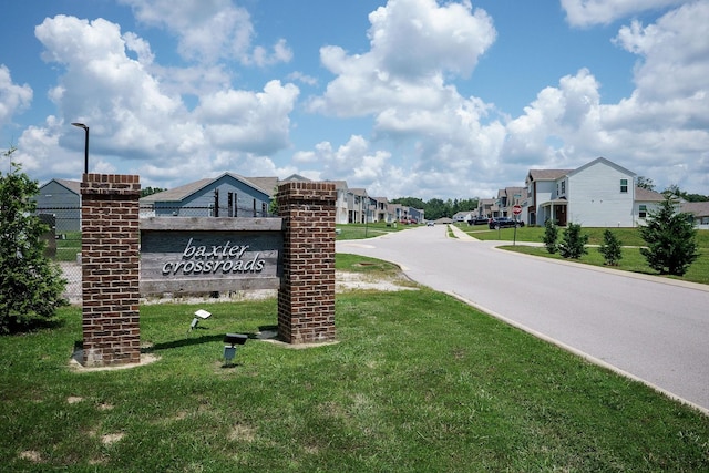 124 Nunally Dr, Baxter, TN 38544 - community sign with a residential view and a yard