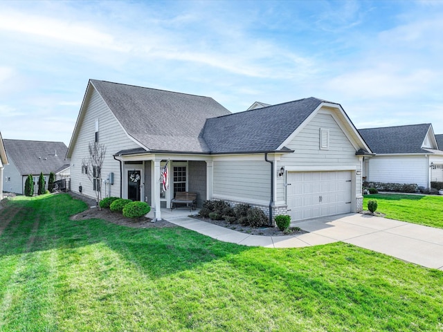 141 Tipton Pass, Spring Hill, TN 37174 - traditional-style home with concrete driveway, a front yard, a garage, roof with shingles, and a porch