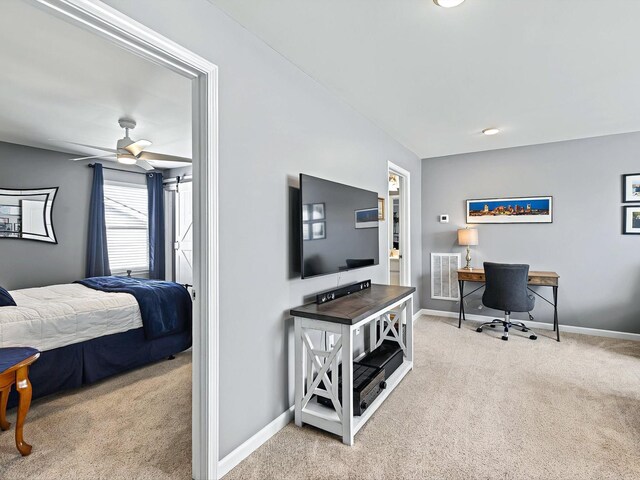 141 Tipton Pass, Spring Hill, TN 37174 - carpeted bedroom with baseboards and a desk
