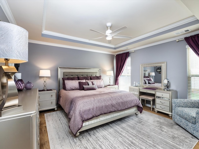 141 Tipton Pass, Spring Hill, TN 37174 - bedroom featuring a tray ceiling, wood finished floors, ornamental molding, and ceiling fan