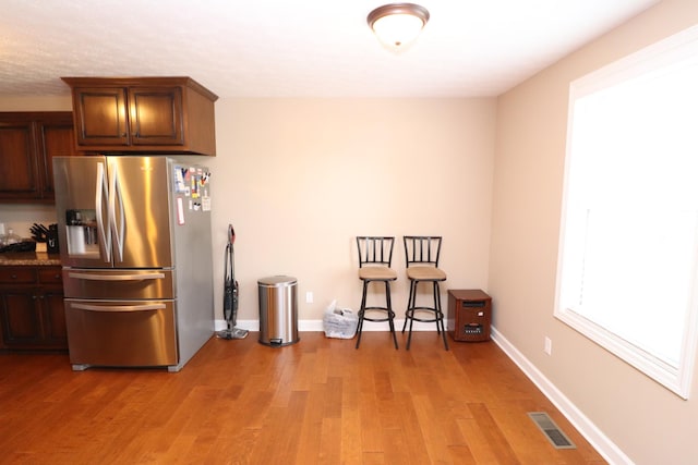 120 Mai Ridge Ln, Lafayette, TN 37083 - kitchen with stainless steel fridge and light wood-style floors